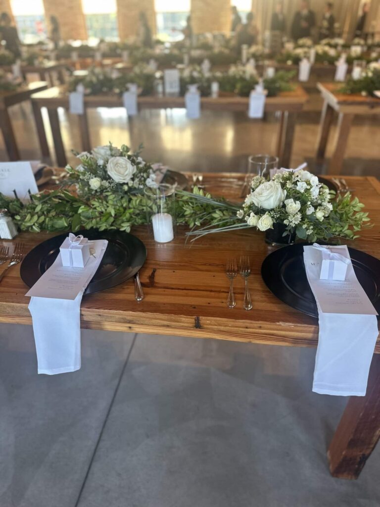 Elegant table setting with floral centerpieces for wedding catering services in Elgin Illinois